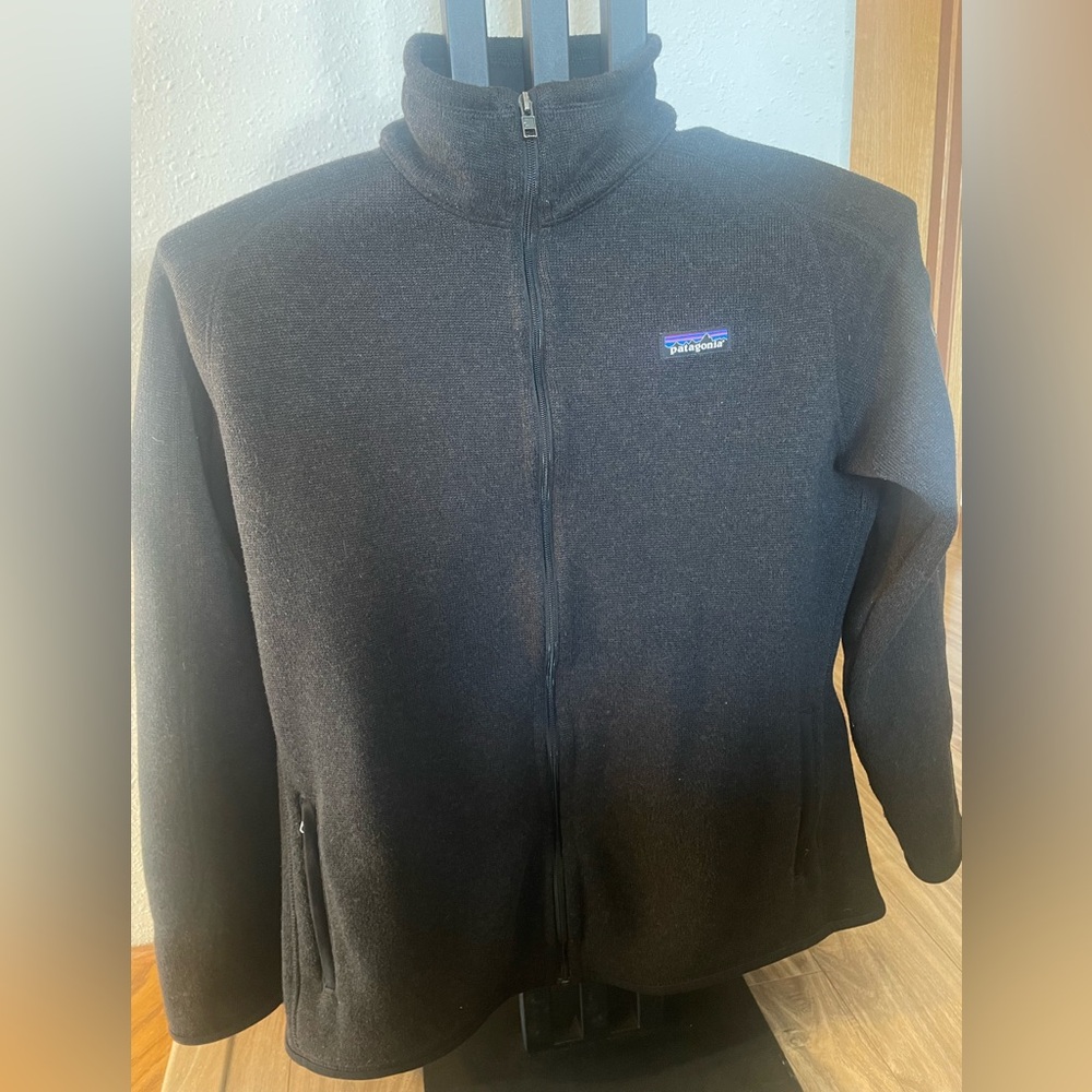 Patagonia Black Jacket with Blue and Purple Logo